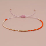 Pearl bracelet in boho style orange, rose, gold