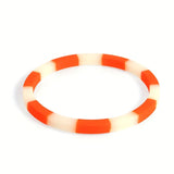 Bangle made of acrylic stripes - orange