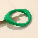 Organically shaped acrylic bangle - green